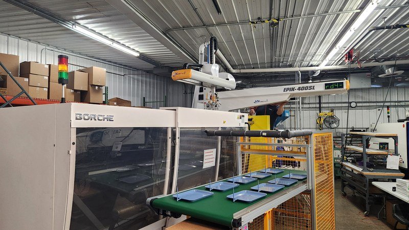 About 7 Injection molding machine producing EV charger housings