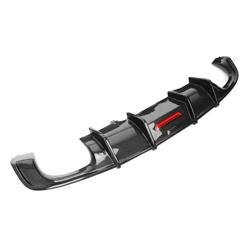 Real Carbon Fibre Rear Diffuser with LED Brake Light for Audi A6 C7 3 Angled view of the carbon fibre rear diffuser showing its vertical fins