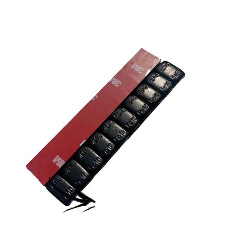 Black coated steel adhesive truck wheel weight strip on red tape