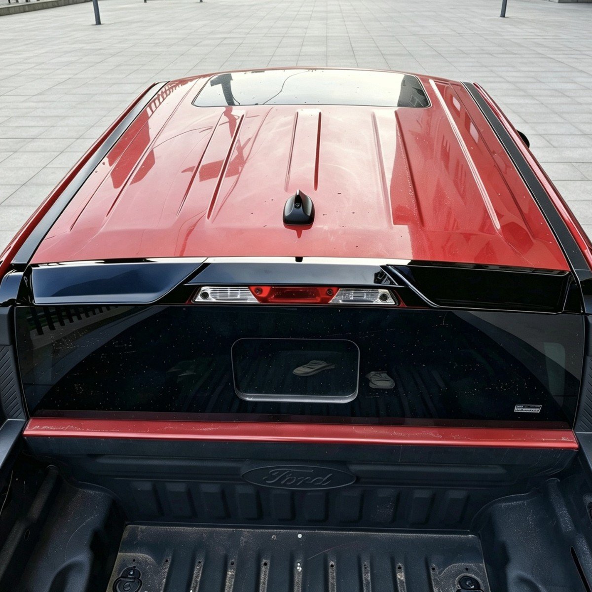 Will a Universal Spoiler Fit Your Car? A Rear Spoiler Fitment Guide 3 Gloss black Ford Maverick roof spoiler following the rear cab edge above the brake light