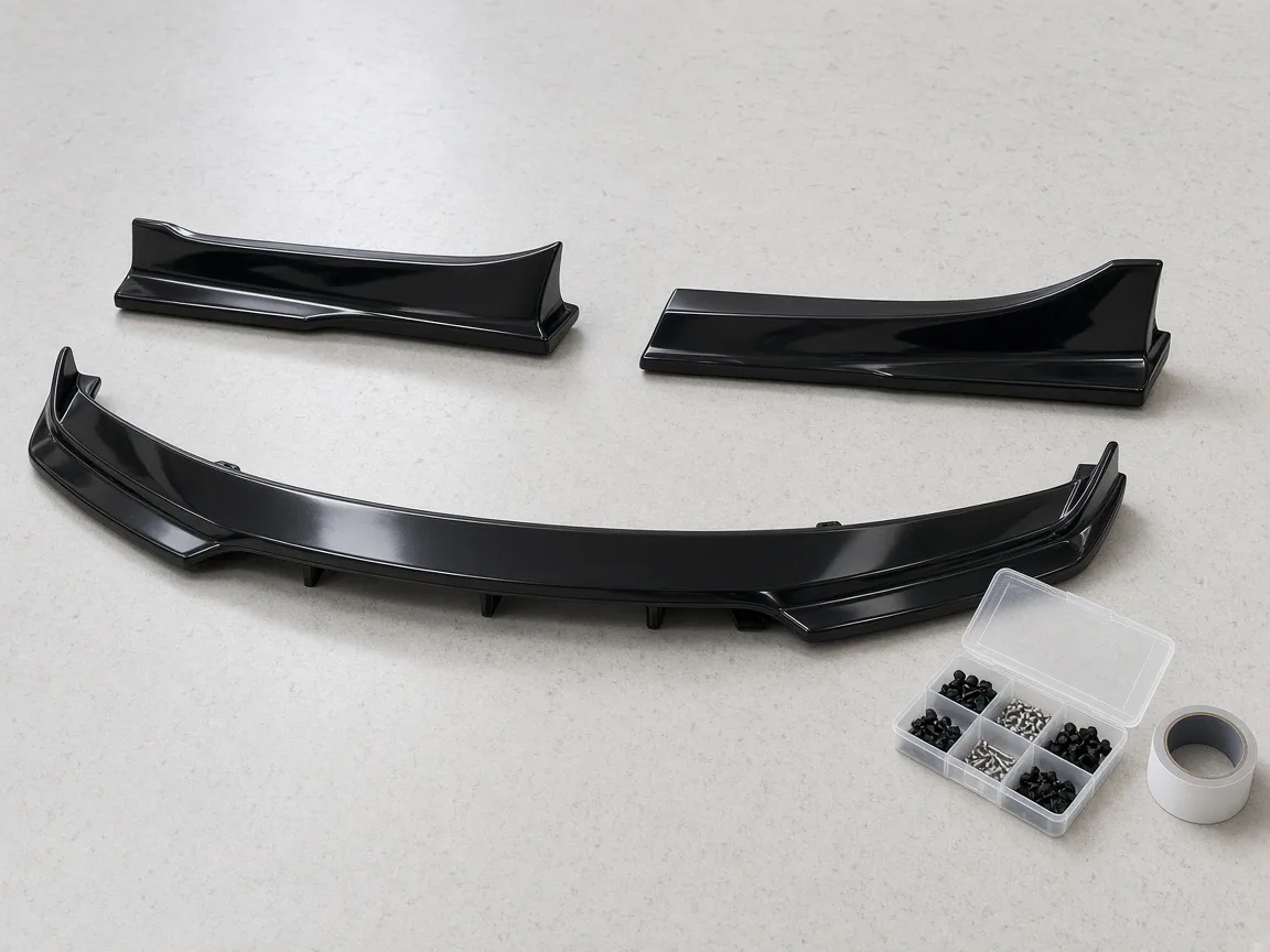 Gloss black front lip and side skirts with a box of clips, screws and mounting tape