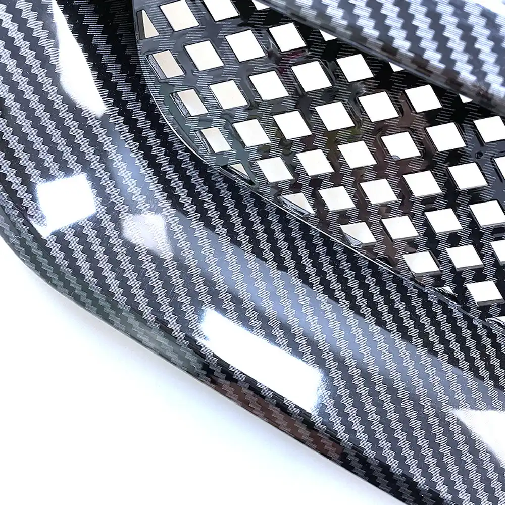 Honda Civic 1999-2000 Mesh Front Grille, ABS 1 Close-up of carbon-fibre pattern finish and diamond mesh on Civic grille