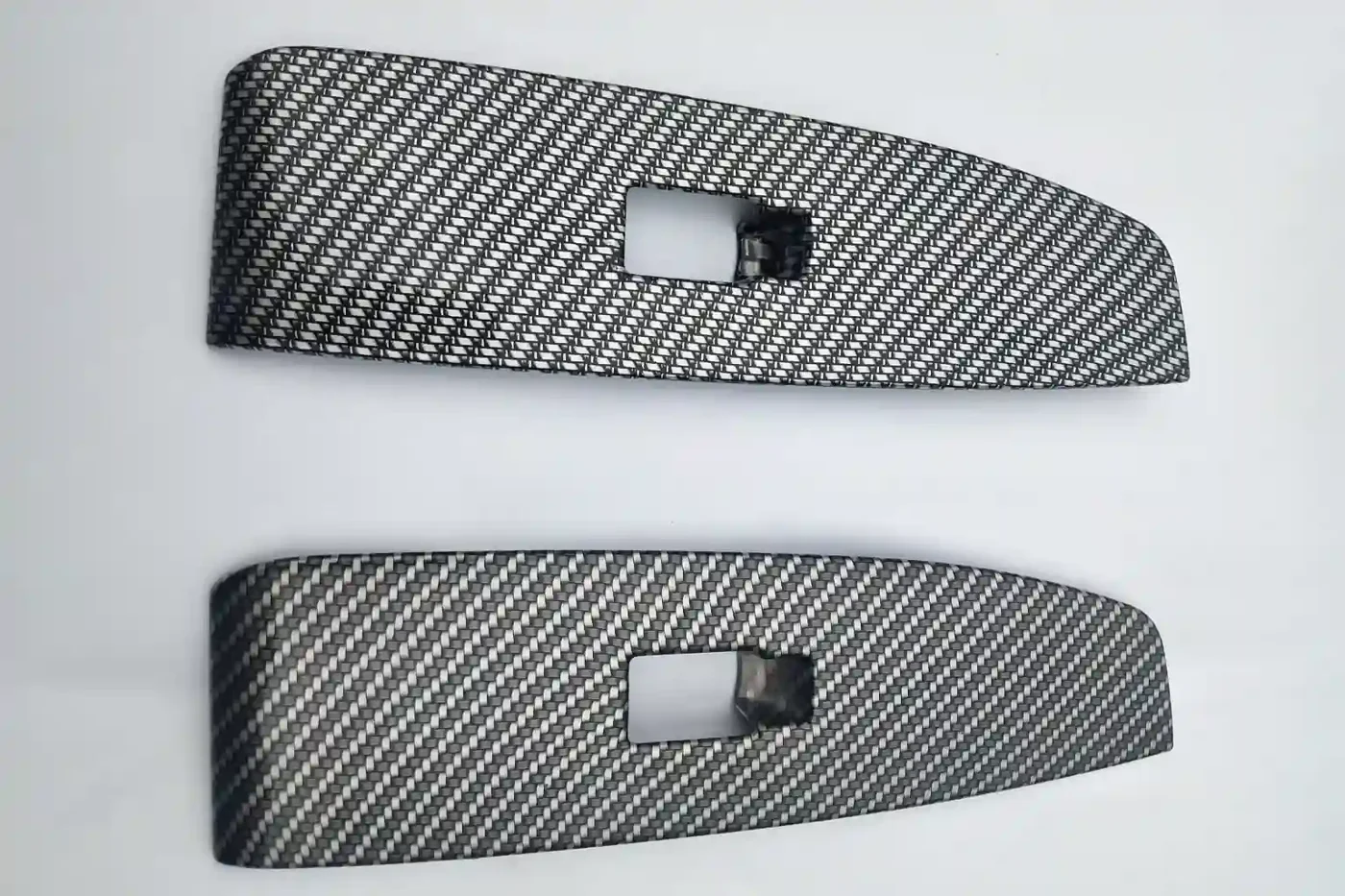 Hydro-dipped carbon fiber pattern window switch panels