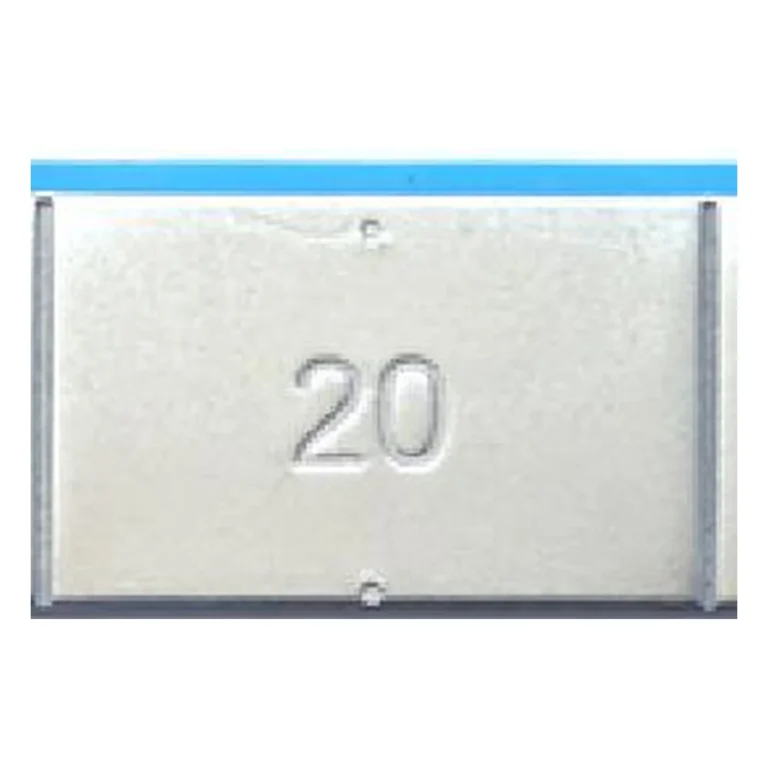 Close-up of grey coated lead 20g adhesive wheel weight segment