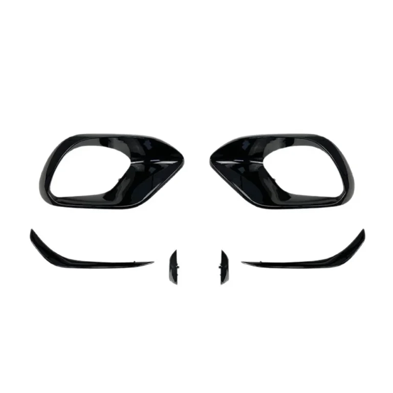 Mercedes-AMG CLA 45 C118 front canards and air vent trims in piano black on white background