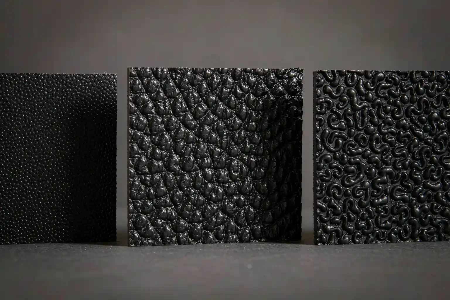 Three mold texture plaques: fine sand, medium grain and coarse leather grain