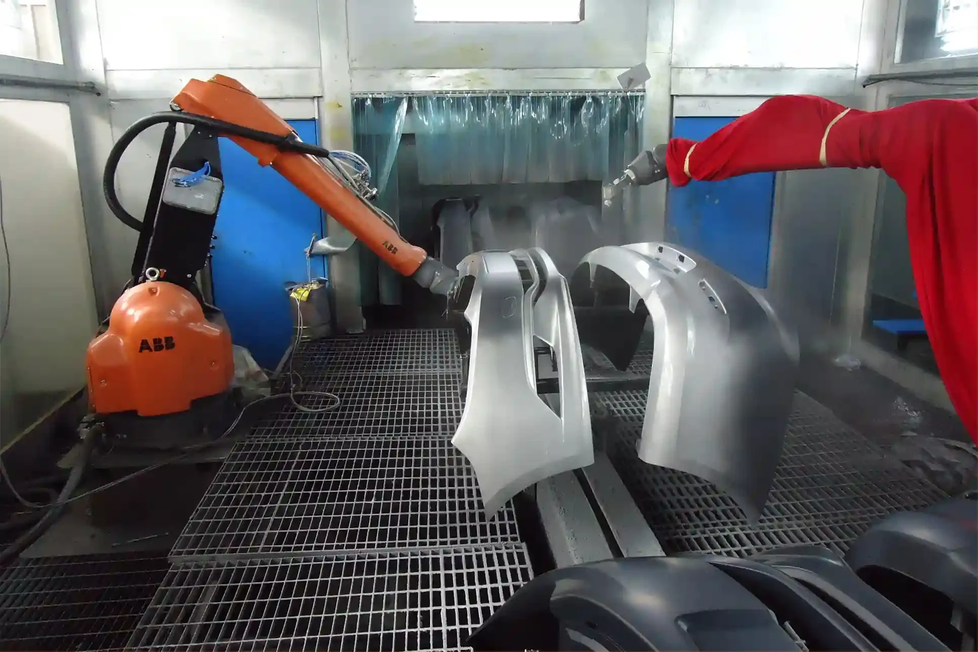 Manufacturing Capabilities 2 Robotic spray painting of bumper covers in a paint booth