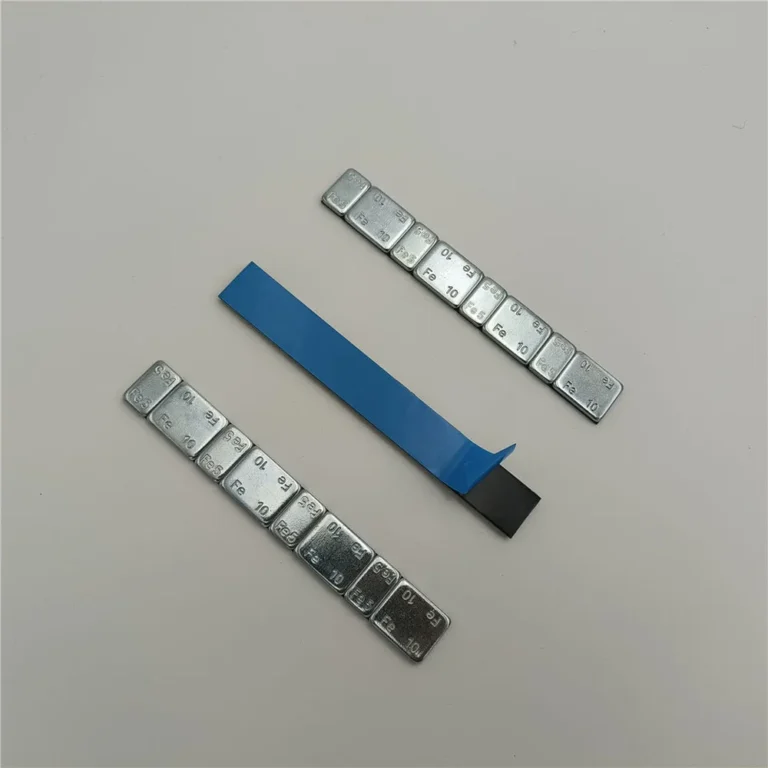 Zinc plated steel 1 oz adhesive wheel weight strips showing the tape backing