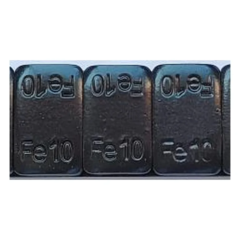 Close-up of black coated thick Fe10 steel adhesive wheel weight segments