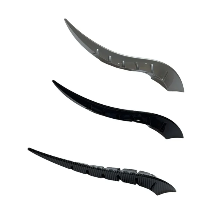 Universal car roof dragon horn decorations in silver, gloss black and carbon on white background