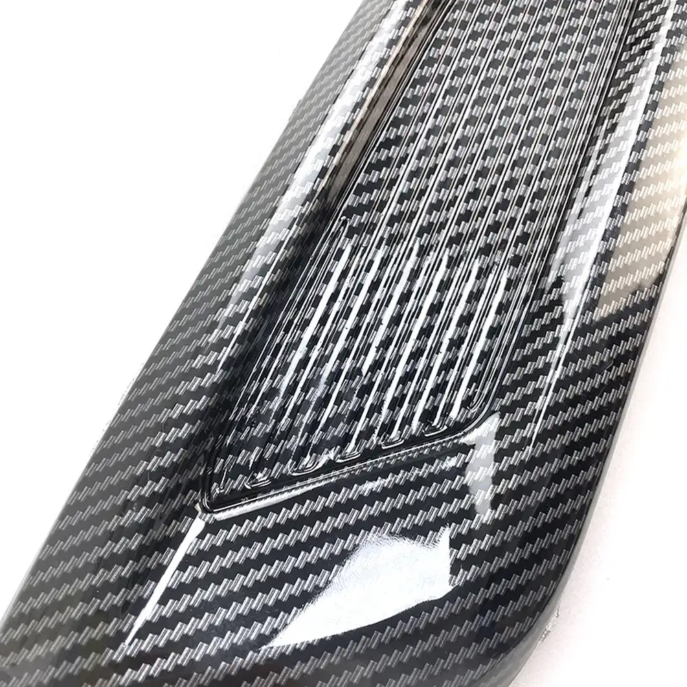 Close-up of water-transfer carbon-fibre pattern on side vent trim