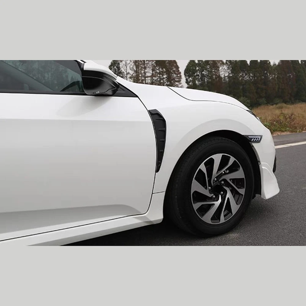 Best 11 Easy Exterior Car Mods for Detailing & Tuning Shops 8 Gloss black fender blade trim installed behind the front wheel arch of a white car