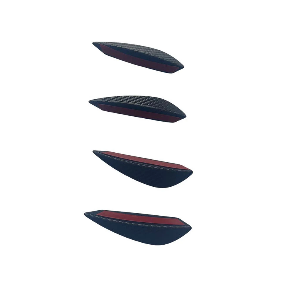 Universal Front Bumper Canards, 4-Piece Set, Gloss Black / Carbon Fibre Black 1 conjunto de 4 canards universais para para-choque dianteiro em preto fibra de carbono em fundo branco