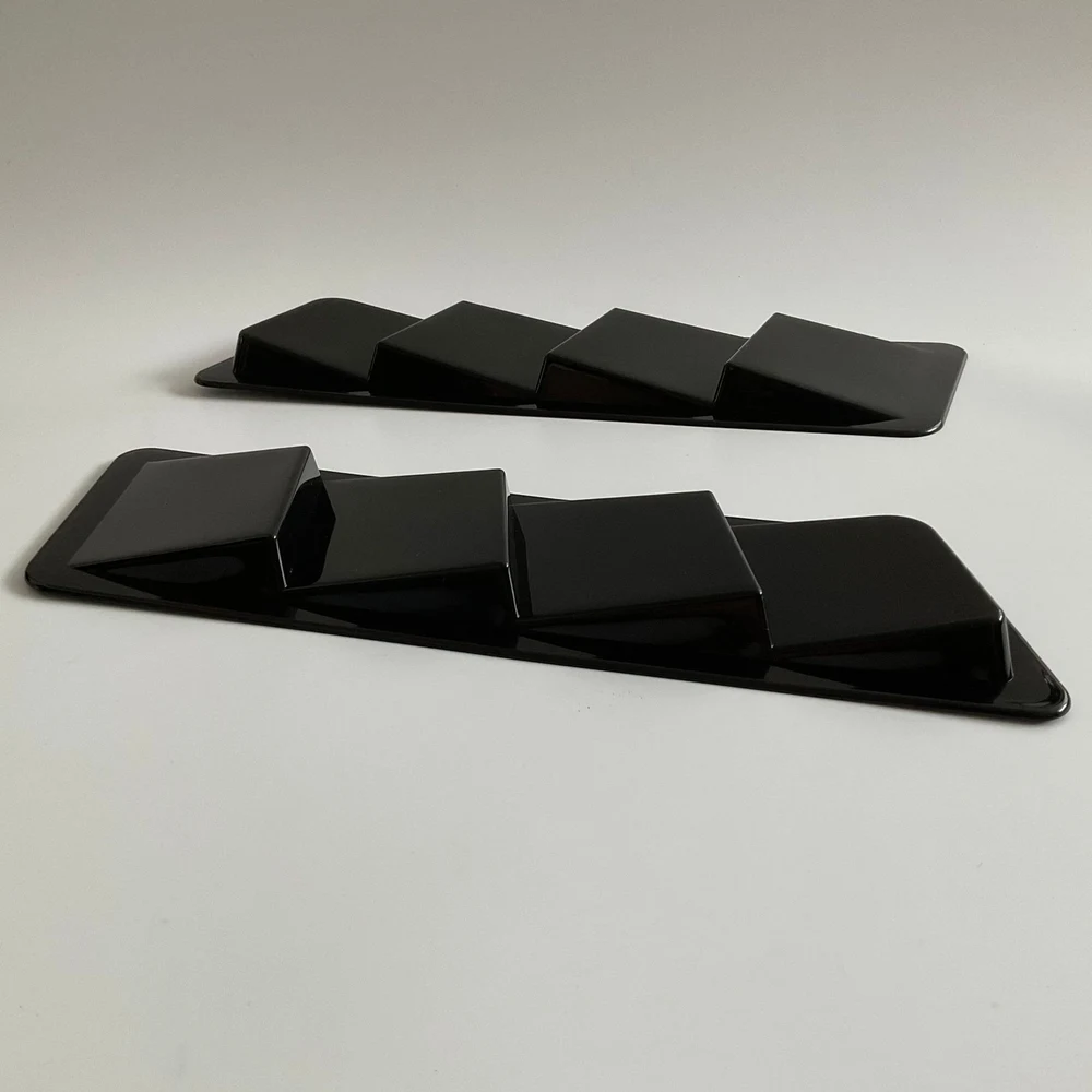 Pair of gloss black louvered side vents