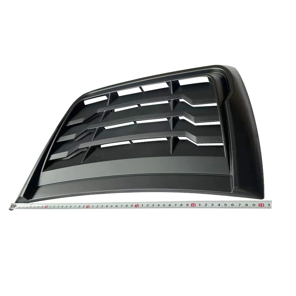 Hood vent measured across its length with a tape measure