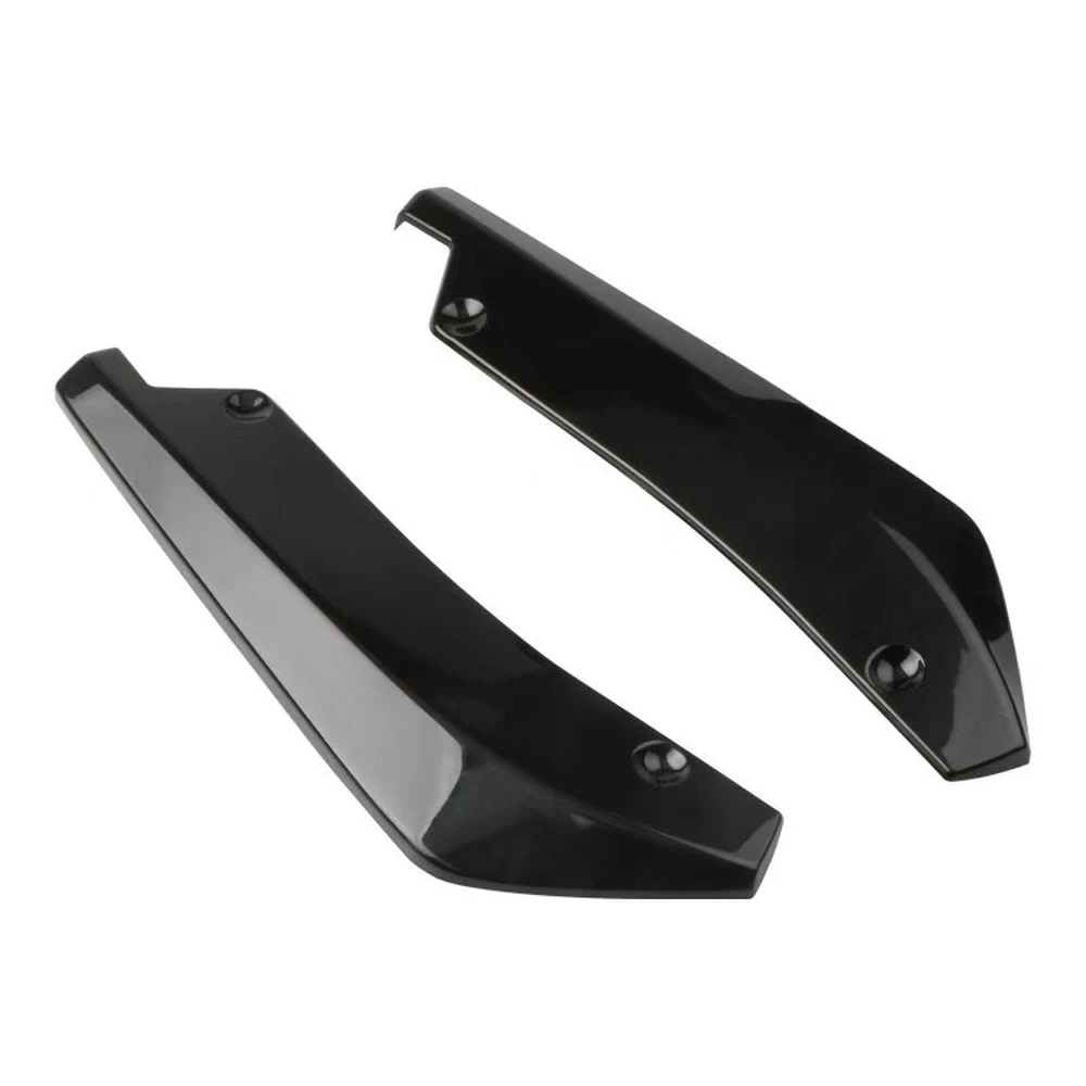 Pair of gloss black universal rear bumper corner splitters on white background