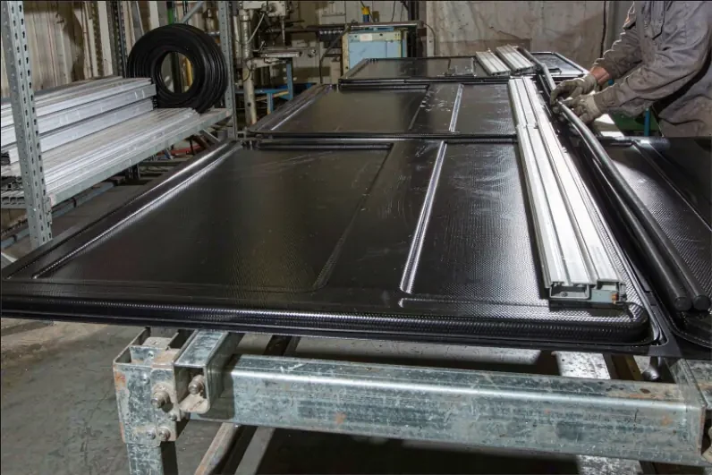 Hard tonneau cover panels on the assembly line